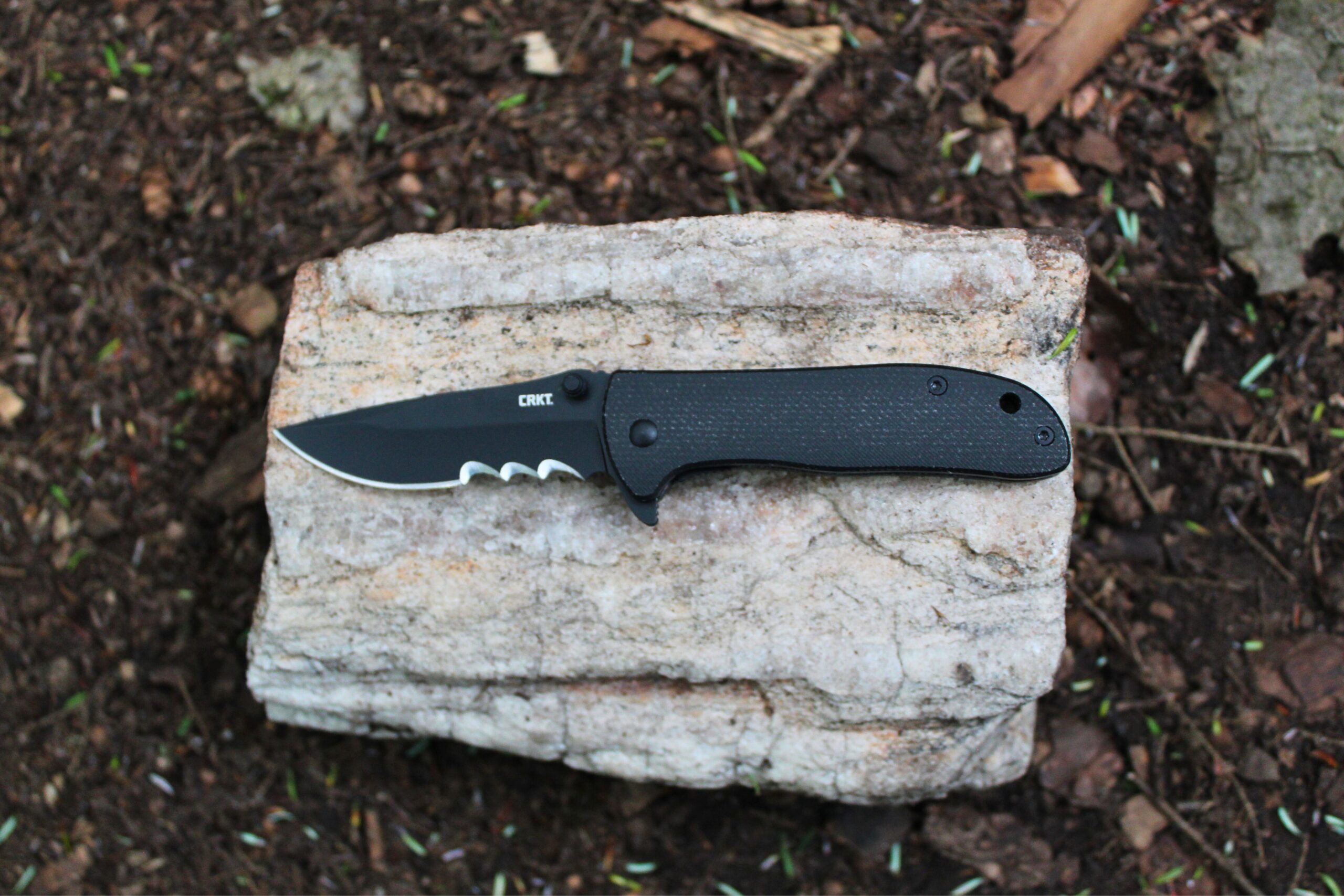 The CRKT Drifter Pocket Knife closed on a rock