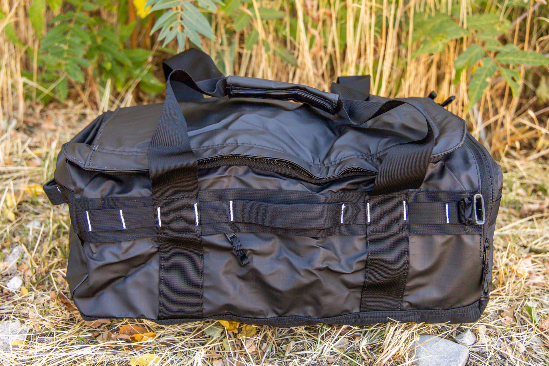 The exterior of the Voyager duffel with grab handles and duffel straps.