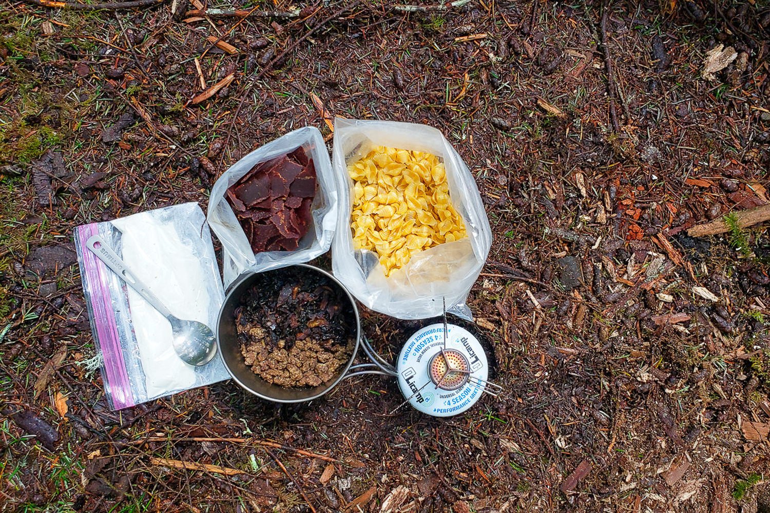 backpackers meal set on the ground