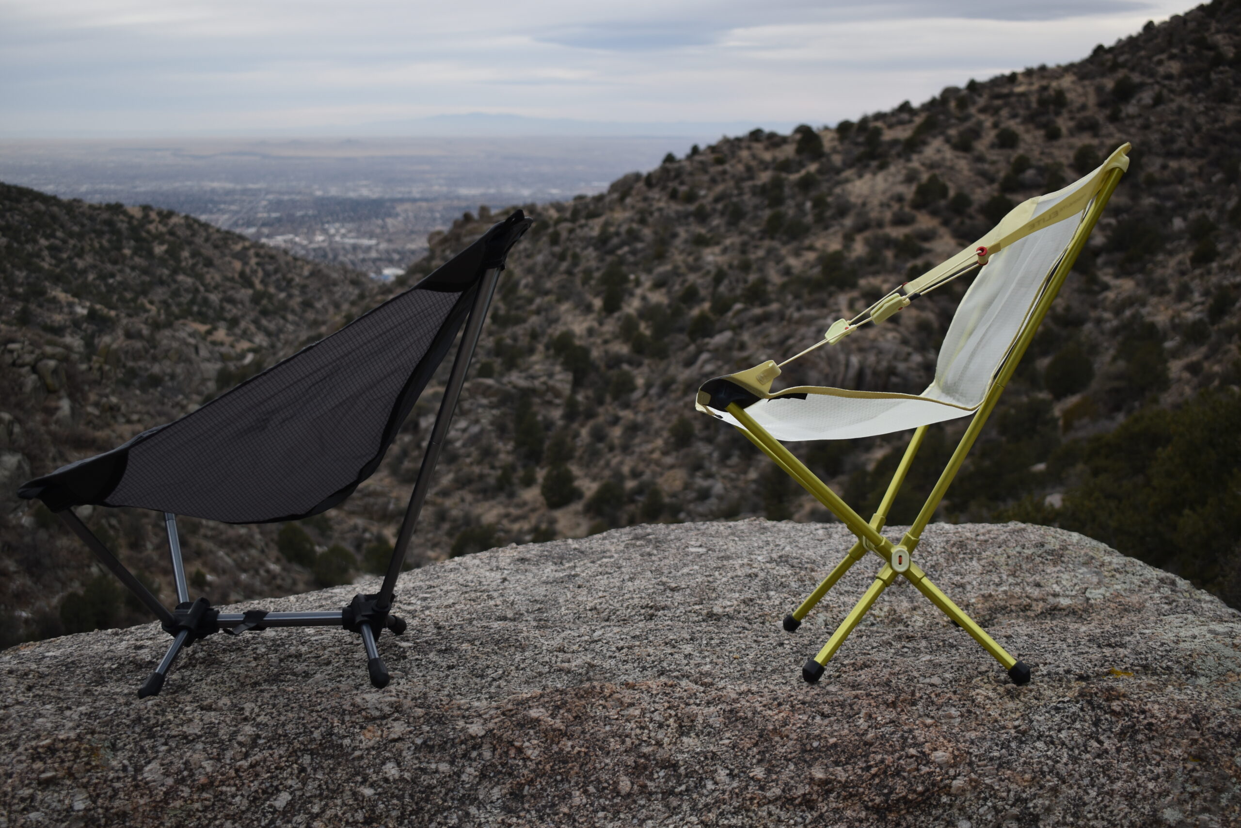 two backpacking chairs side by side shows the Trekology Yizi Lite's reclining seat position